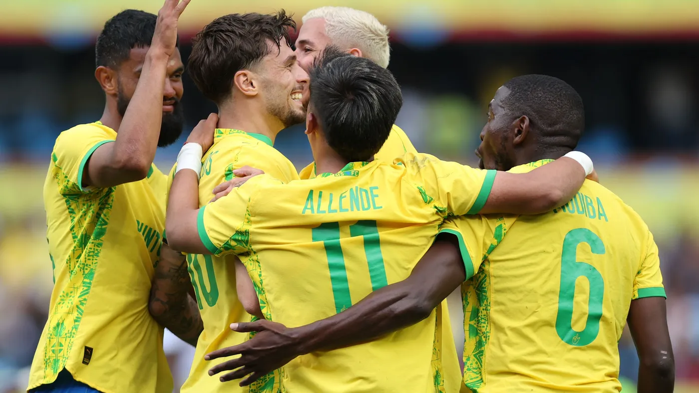 Mamelodi Sundowns players embracing after a goal